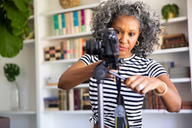 Black Woman Setting up Tripod and Camera to Record Vlog