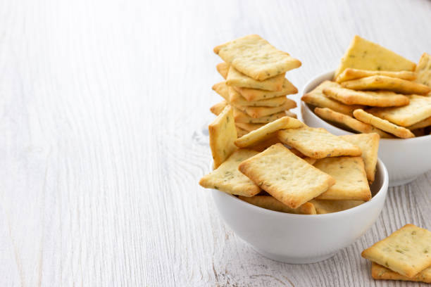 istock Dry salty cracker cookies in bowl 1136640394