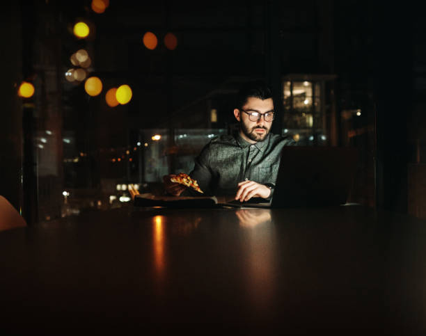 istock Logged onto late night productivity 1136640891