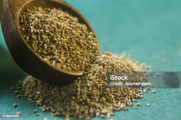 Ajwain Seeds In A Wooden Spoon Stock Photo - Download Image Now - Carom, Seed, Ayurveda