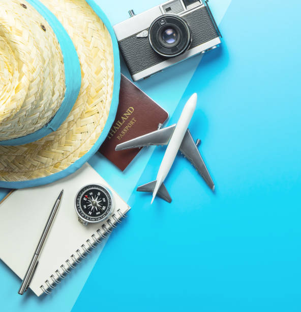 istock Summer travel blogger accesories on blue shading copy space 1136642310