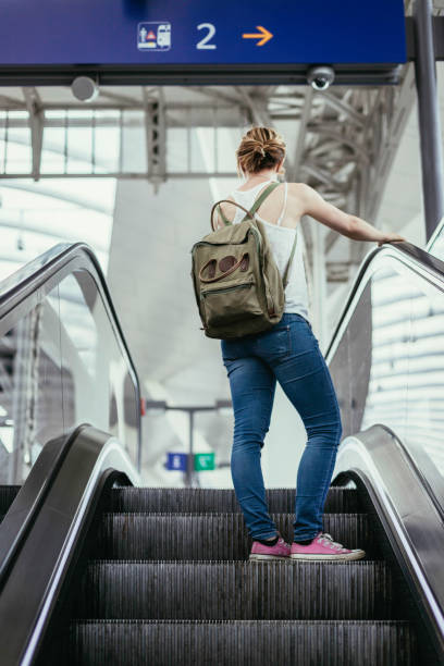 istock Young girl at the train station: Journey 1136643777
