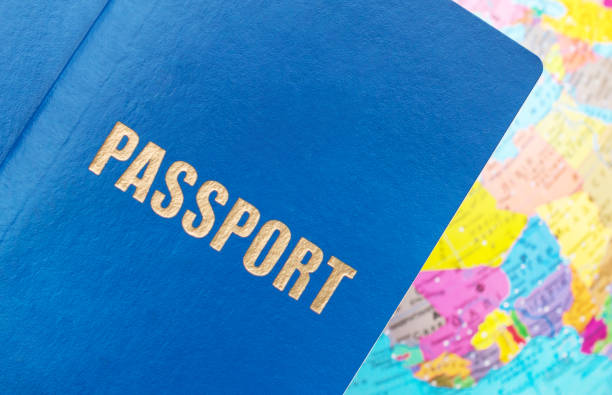 istock Passport on the world map background. 1136646212