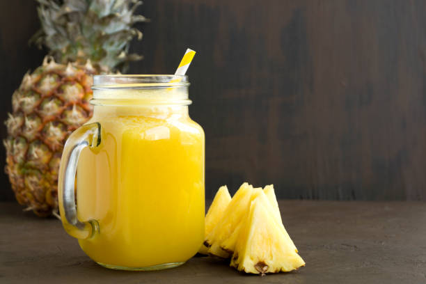 istock Pineapple juice in a jar with a straw. 1136648185