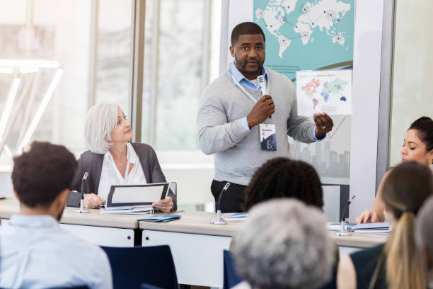 istock International businessman gives speech during seminar 1136648315