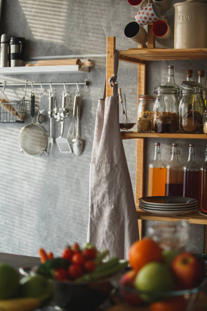 istock Kitchen shelves and kitchen utensils hanging on the wall 1136650746