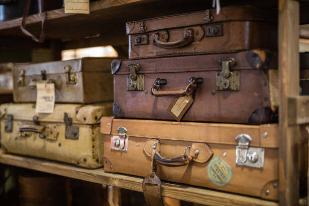 istock Old Leather Travel Cases on a Shelf 1136651720