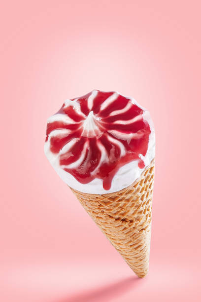 istock Ice cream cone isolated on a pink background 1136653437
