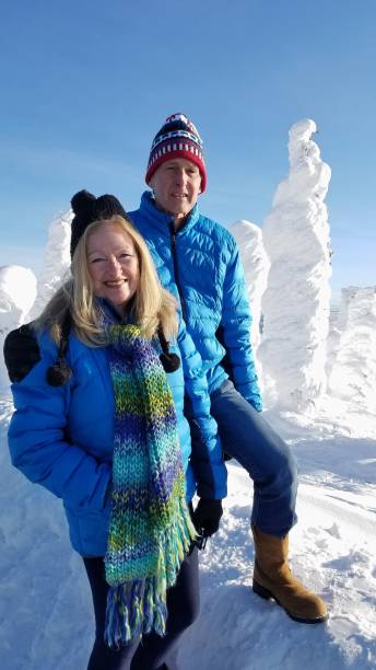 2 Senior Adults, Male and Female, Enjoying the Arctic Climate stock photo