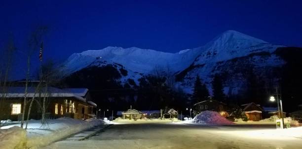 istock Night Time View of a Ski Resort, Illuminated by Moonlight 1136653693