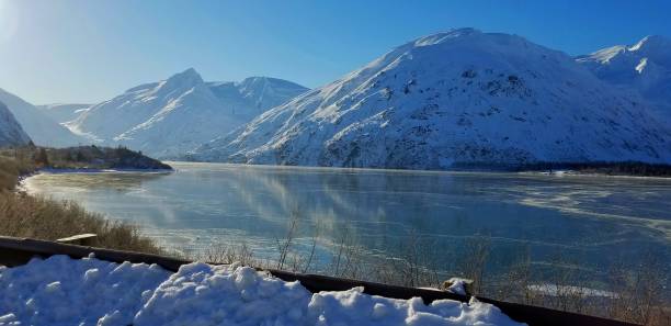 istock Light Fog Lifting Off Water in Polar Climate 1136653767
