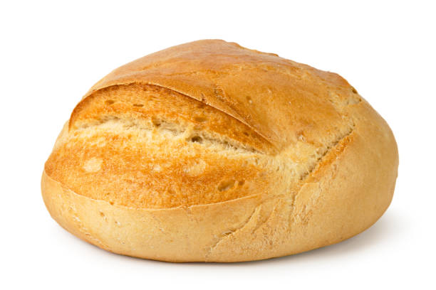 istock A loaf of fresh bread close-up on a white. Isolated. 1136653830