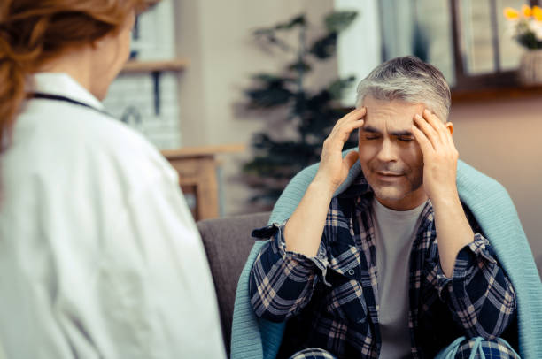 istock Depressed mature man suffering from strong headache 1136655121