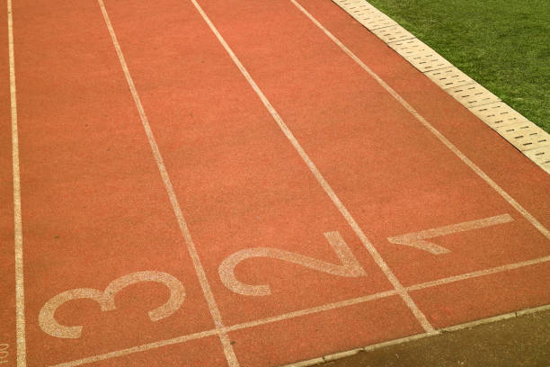 istock Running track around the football field 1136655224