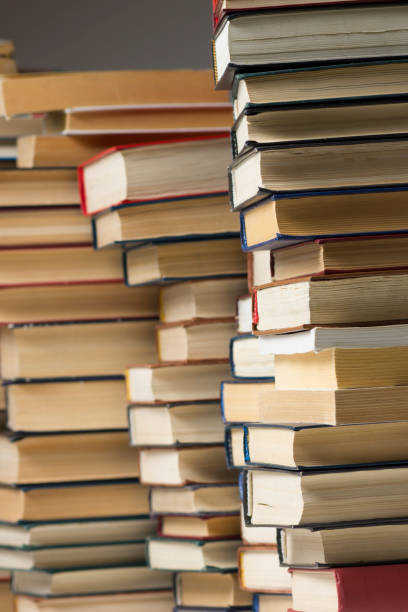istock Stack of books background. many books piles. 1136655535