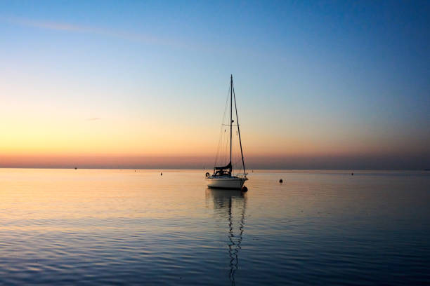 Yacht moored in Mersea Quarters, Essex, England