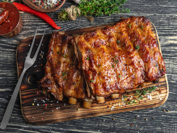 istock grilled pork ribs with sauce on a cutting board , spice, marinade 1136658094