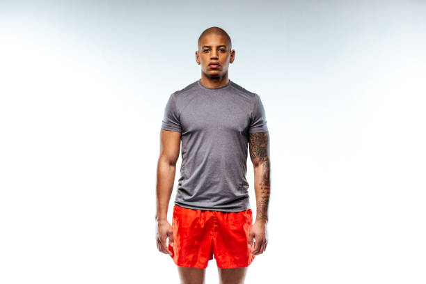 istock Man wearing sport suit with red trousers 1136658281