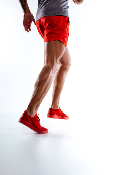 istock Mans figure wearing red shorts performing running movements 1136658307