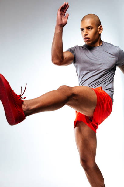 istock Man moving his arm and leg upwards 1136658320