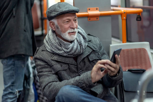 istock Mature Man Riding In A Bus 1136658472