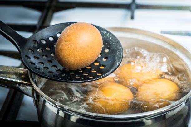 istock Boil chicken eggs in a metal pan. 1136659446