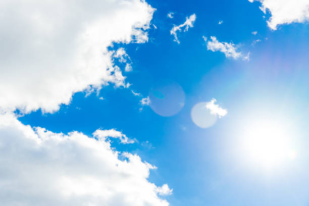 istock Photo of a blue Sunny sky with white clouds. 1136661431