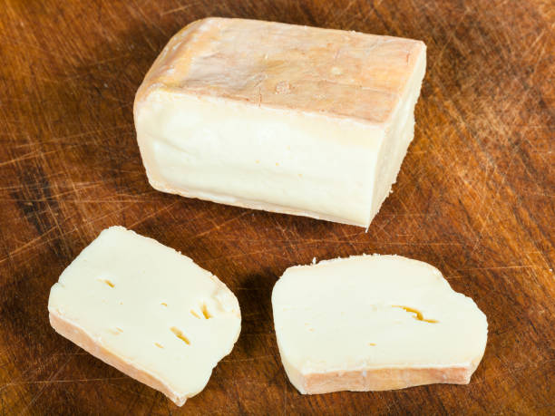 istock sliced local italian Taleggio cheese on board 1136661602
