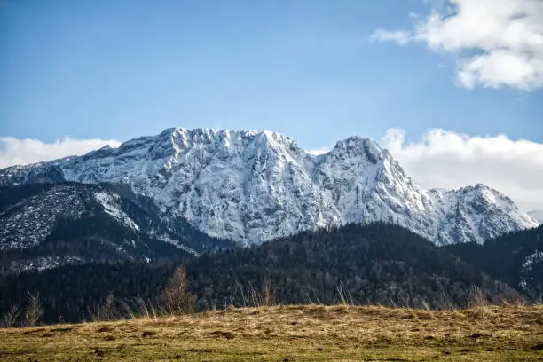 The Giewont mountain (The Sleeping Knight) in Tatra mountains (Poland) covered with snow.