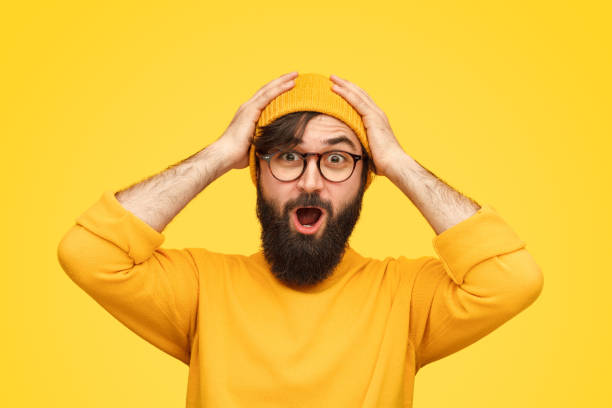 istock Colorful hipster man in yellow outfit 1136668079