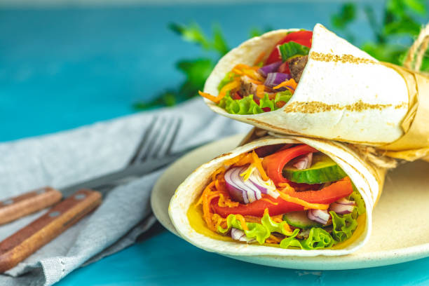 istock Shawarma sandwich with grilled meat, vegetables, cheese 1136669143