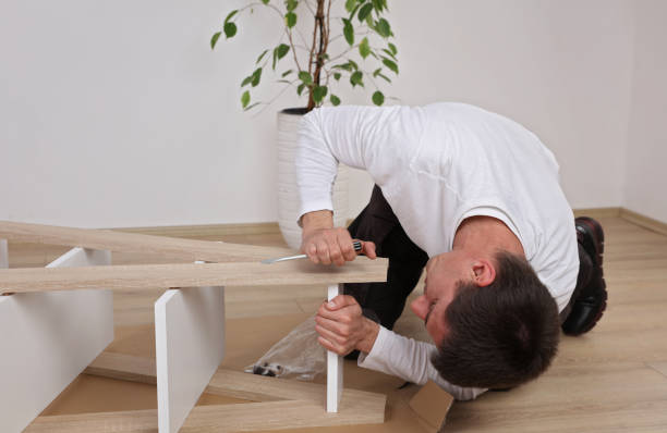 istock Man doing renovation work at home,assembling furniture, moving in new house, DIY concept 1136669255
