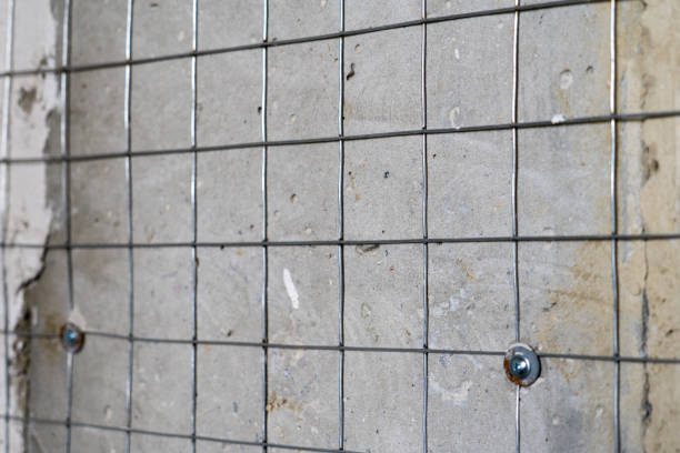 istock Metal welded mesh for better adhesion of plaster on the walls. 1136670667