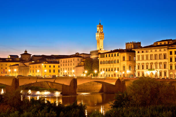istock Arno river waterfront and Florence landmarks evening view 1136672143