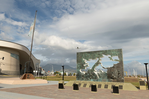 Ushuaia, Argentina - January 12, 2019: Image of the Malvinas War National Historical Monument (Falklands War) and the casino in the city center of Ushuaia in Argentina