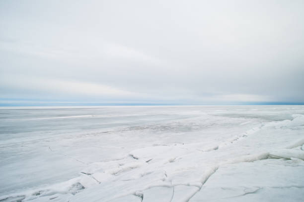 icy landscape icy landscape, ice covered lake, cold north, nordic country, dramatic ice landscape, high resolution photo, fullframe, cold winter day, empty and emotional landscape north pole photos stock pictures, royalty-free photos & images
