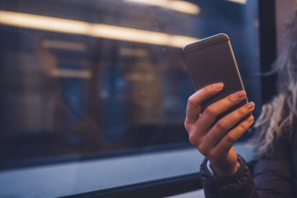 istock Mobile phone in woman hand. 1136675712