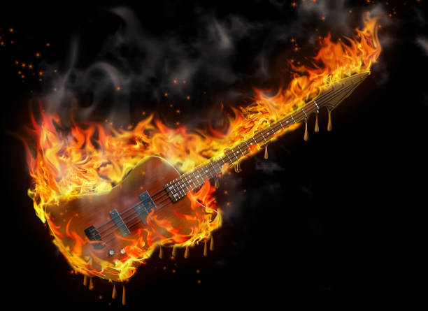 istock Burning and melting bass guitar 1136676850