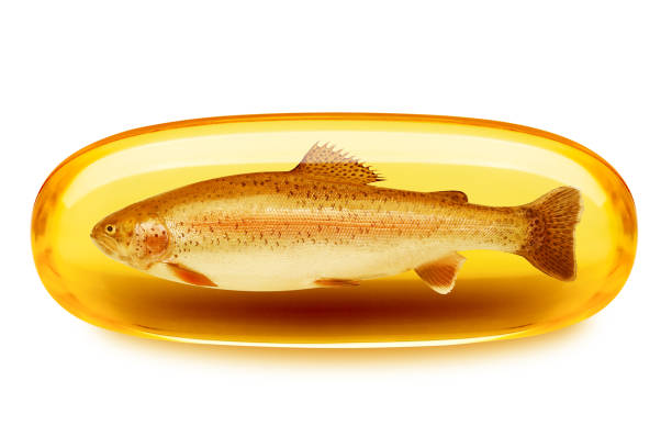 comprimido do óleo de peixes, omega 3, isolado no fundo branco, trajeto de grampeamento, profundidade de campo cheia - gel effect capsule pill vitamin e - fotografias e filmes do acervo