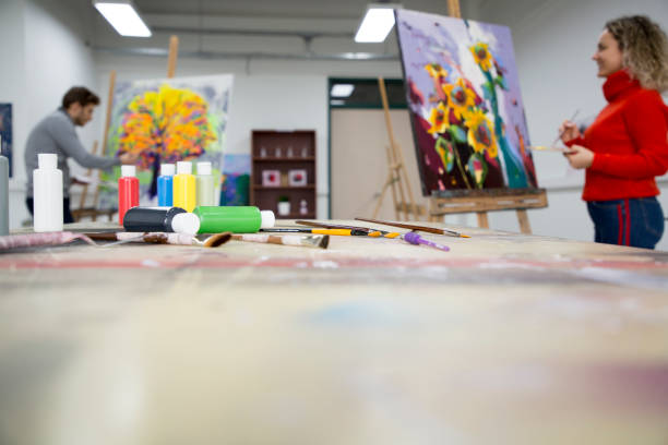 istock Fine art students working on painting 1136679147
