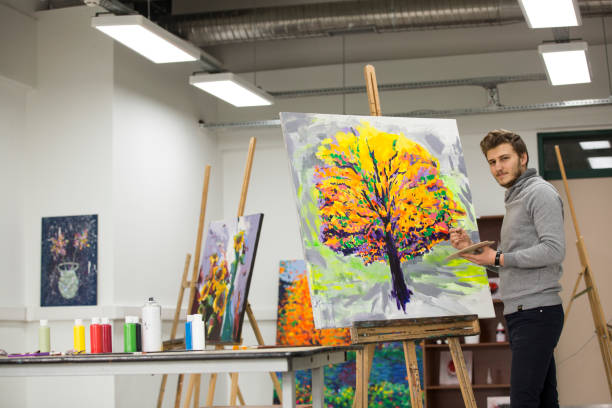 istock Fine art students working on painting 1136679184