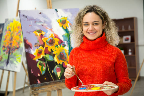 istock Fine art students working on painting 1136679255