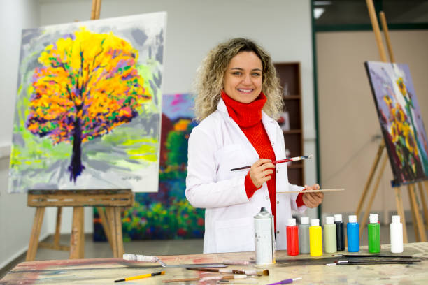 istock Fine art students working on painting 1136679274