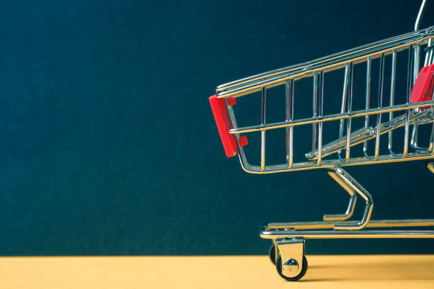 istock A trolley on a black background. Symbol 