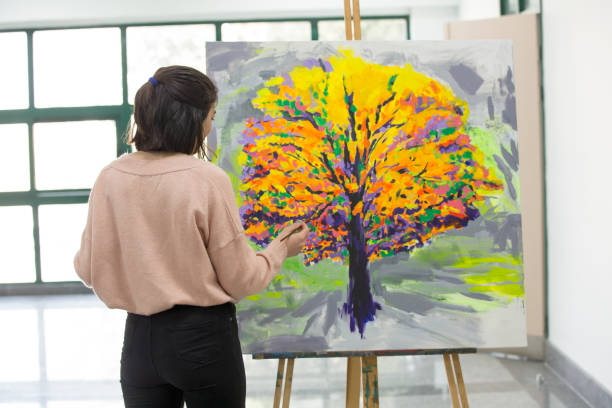 istock Fine art students working on painting 1136681977