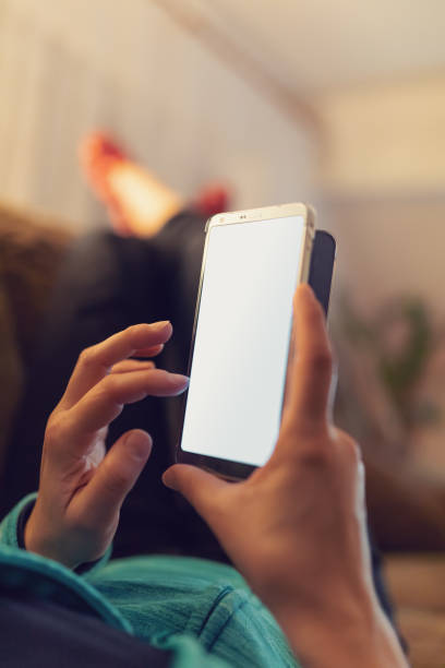 istock woman hand holding mobile phone 1136682221
