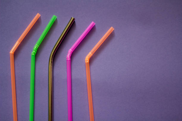 istock Plastic straws and reusable straw. Zero waste and plastic pollution concept 1136682891