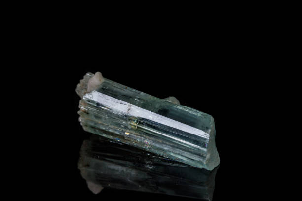 istock macro mineral stone aquamarine on a black background 1136682997