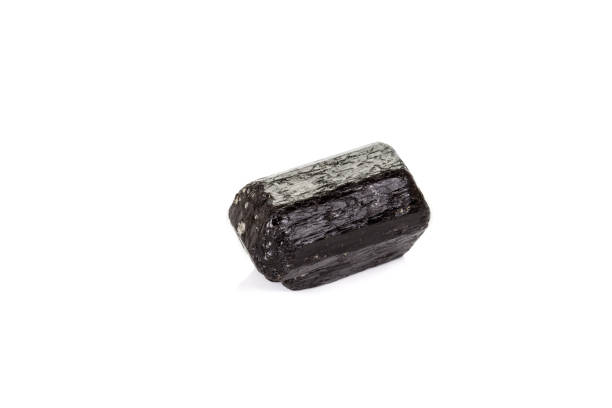 istock macro mineral stone schorl, black tourmaline on white background 1136683020