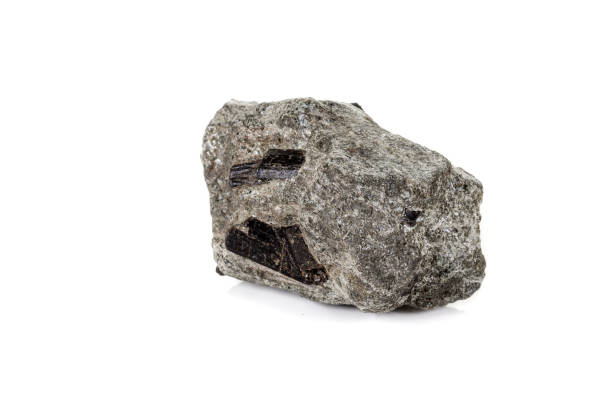 istock macro mineral stone schorl, black tourmaline on white background 1136683084